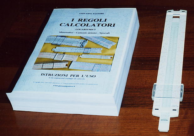 First proof and slide rule - Prima bozza di stampa del libro di Giovanni Pastore e regolo calcolatore